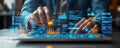 Businessman using laptop, analyzing sales data with digital interface, graphs, and charts, showcasing modern technology and