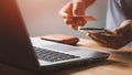 Businessman using laptop computer with a credit card making an online order. Royalty Free Stock Photo