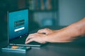 Businessman using laptop computer for encryption, cybersecurity concept on the internet