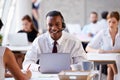 Businessman Using Laptop In Customer Service Department Royalty Free Stock Photo