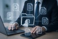 Businessman using laptop with digital folder and document workflow connections Royalty Free Stock Photo