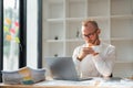 businessman using laptop and drinking coffee at office Royalty Free Stock Photo