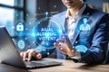 Businessman using laptop, interacting with digital interface showing AI, security, and user data