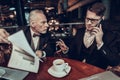 Young Man talking on Phone on Business Meeting