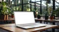 Mockup image of laptop with blank white screen on wooden table in cafe. AI Generated Royalty Free Stock Photo