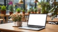 Mockup image of laptop with blank white screen on wooden table in cafe. AI Generated Royalty Free Stock Photo