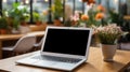 Mockup image of laptop with blank white screen on wooden table in cafe. AI Generated Royalty Free Stock Photo