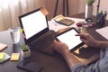 Businessman using laptop and a smart phone Royalty Free Stock Photo