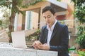 Businessman using laptop and smartphone Royalty Free Stock Photo