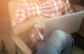 Businessman using laptop on sofa in coffee shop Royalty Free Stock Photo