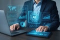 Businessman using laptop and tablet with AI interface and data charts overlay artificial intelligence Royalty Free Stock Photo