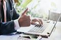 Businessman using laptop working on the desk Royalty Free Stock Photo