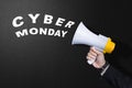 Businessman using a megaphone to announce Cyber Monday Royalty Free Stock Photo