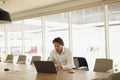 Businessman using mobile phone in the conference room Royalty Free Stock Photo