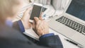 Businessman using mobile phone in office Royalty Free Stock Photo