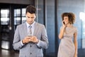 Businessman using mobile phone in office Royalty Free Stock Photo