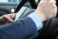 The businessman using mobile smart phone while driving the car Royalty Free Stock Photo