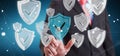 Businessman using modern data shield antivirus 3D rendering Royalty Free Stock Photo