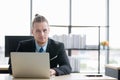 Businessman using notebook computer in office Royalty Free Stock Photo