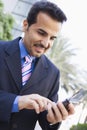 Businessman using PDA Royalty Free Stock Photo