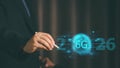 Businessman using pen touching 6G high speed internet connection concept. Global wireless network, future technology 2026, digital Royalty Free Stock Photo