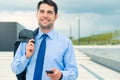 Businessman using phone on travel Royalty Free Stock Photo