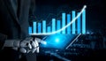 Businessman Using Robot Hand to Analyze Growth Chart on Digital Tablet in Futuristic Environment Impute Royalty Free Stock Photo