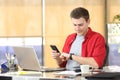 Businessman using smart watch and mobile phone Royalty Free Stock Photo