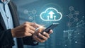 Businessman using smartphone with cloud computing and network connection Royalty Free Stock Photo
