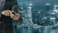 Businessman Using Smartphone Displaying Code and Data Overlay, Technology Concept with Urban Background for Modern Royalty Free Stock Photo