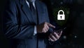 Businessman using Smartphone with Padlock icon and internet technology networking. protecting data personal information. privacy Royalty Free Stock Photo