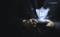 Businessman using smartphone to access biometric data by input password or fingerprint scanner for access security system ,