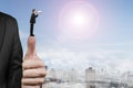 Businessman using speaker shouting on another man big hand thumb