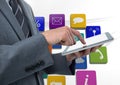 Businessman using tablet against applications icons Royalty Free Stock Photo