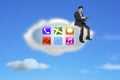 Businessman using tablet on app icons cloud with nature sky Royalty Free Stock Photo
