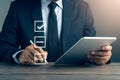 Businessman Using Tablet with Checklist Royalty Free Stock Photo