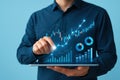 Businessman using tablet with financial graph for business data analysis Royalty Free Stock Photo