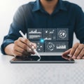 Businessman using a tablet with futuristic data visualization Royalty Free Stock Photo