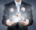 Businessman using tablet showing dice