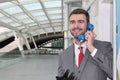 Businessman using traditional pay phone Royalty Free Stock Photo