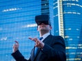 Businessman using virtual reality glasses in a business center a Royalty Free Stock Photo