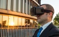 Businessman using virtual reality glasses in a business center Royalty Free Stock Photo