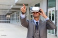 Businessman using virtual reality glasses Royalty Free Stock Photo