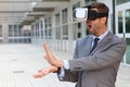 Businessman using virtual reality glasses Royalty Free Stock Photo