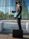 Businessman using virtual reality glasses for a meeting in cyberspace Royalty Free Stock Photo