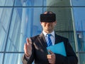 Businessman using virtual reality glasses for a meeting in cyberspace