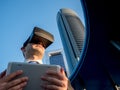 Businessman using virtual reality glasses with a tablet in a bus