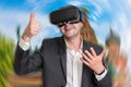 Businessman using virtual reality headset glasses Royalty Free Stock Photo