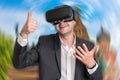 Businessman using virtual reality headset glasses Royalty Free Stock Photo