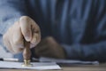 Businessman using wood stamping on document for approve and reject project and financial concept Royalty Free Stock Photo